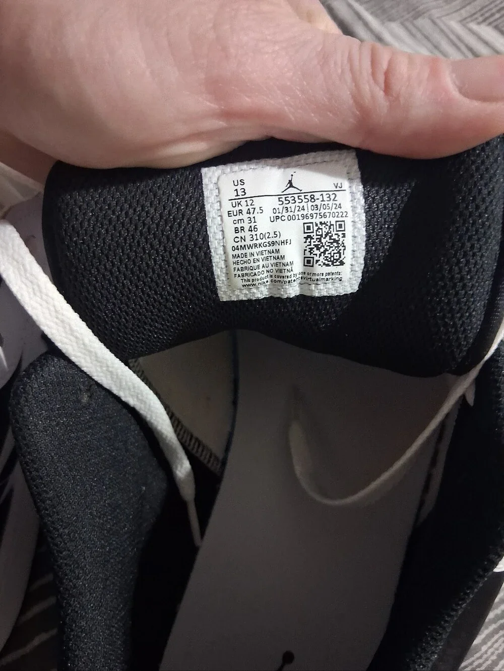 Jordan 1 Low-Top White Sneakers with Black Swoosh